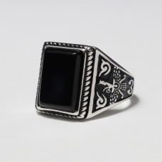 Ring with black stones
